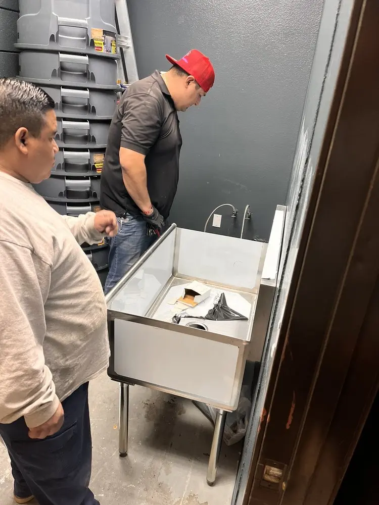 Commercial plumbing and sink installation in Regis